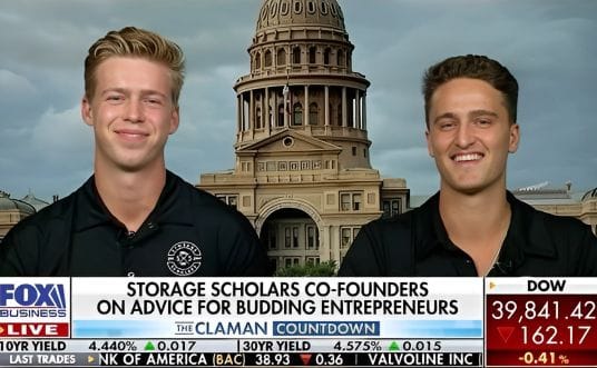 Storage Scholars co-founders appearing live on Fox Business Network's The Claman Countdown, with a lower-third chyron reading 'Storage Scholars Co-Founders on Advice for Budding Entrepreneurs'